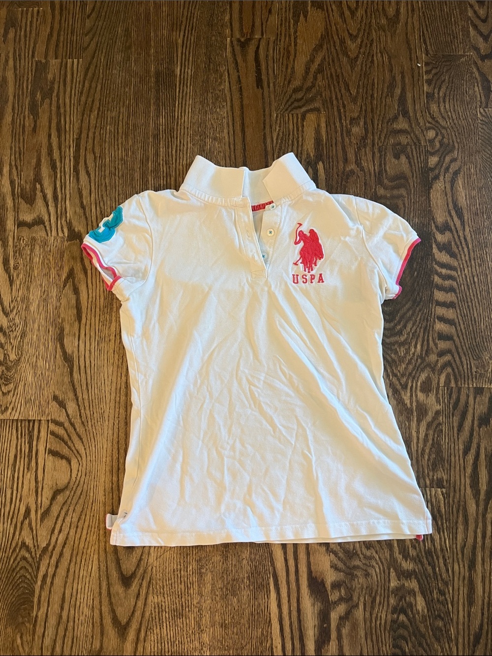 U.S. Polo Assn. White Polo with Pink Logo and Teal Sleeve Detail